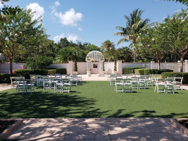 Outdoor wedding ceremony - socially distant wedding ceremony - physically distant outdoor wedding ceremony - Pinellas Botanical Gardens intimate wedding ceremony -safety protocols for weddings during covid