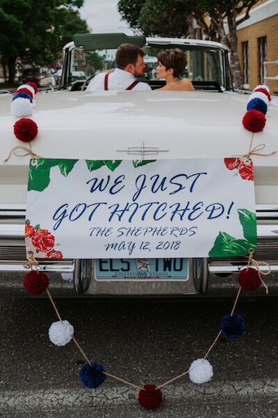 special moments event planning. - bride and groom driving off in a vintage white convertible - Saint Petersburg Florida wedding - vintage Americana wedding