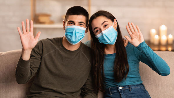 bride and groom wearing face masks - couple planning their wedding