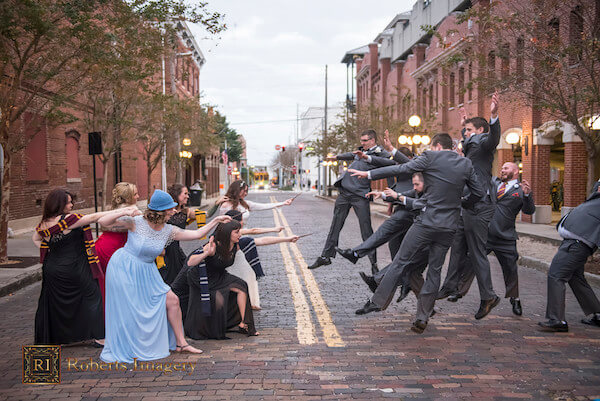 Harry Potter themed wedding with wand fight between bridesmaids and groomsmen 