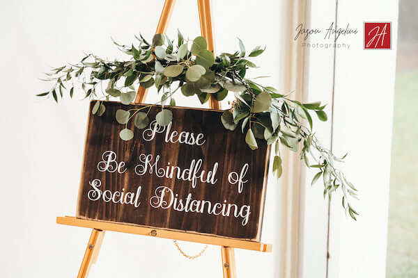 decorative sign to promote social distancing at Tampa wedding