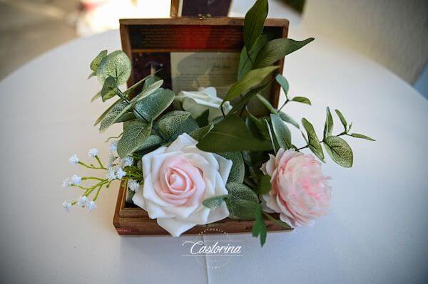 cocktail table floral arrangement made in a cigar box