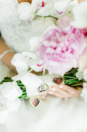 pink and blush bridal bouquet with personal family photo lockets