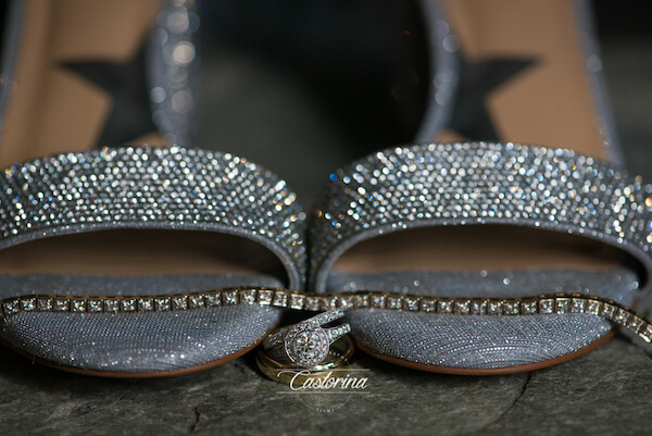 rhinestone covered wedding shoes, bracelet and wedding rings