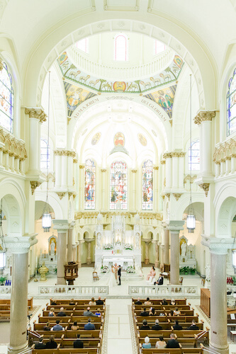 Socially distant wedding with assigned seating at Sacred heart Catholic Church in Tampa