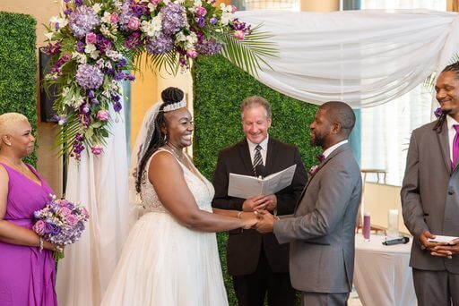 bride and groom exchanging their wedding vows in their Clearwater Beach wedding ceremony