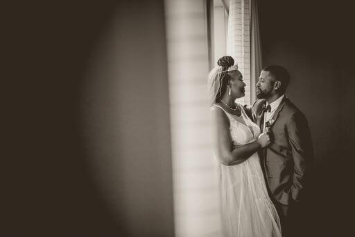 black and white photo of the bride and groom spending some time alone