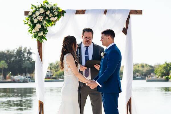 Bride and groom exchange wedding vows 