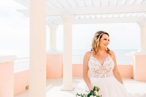 bride in a modern lace wedding gown at the Hyatt Clearwater beach