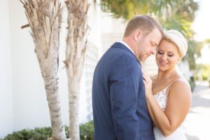 bride and groom after their first looks at their Clearwater Beach wedding