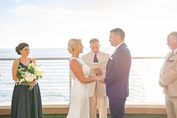 bride and groom exchanging wedding vows at the Clearwater Beach wedding