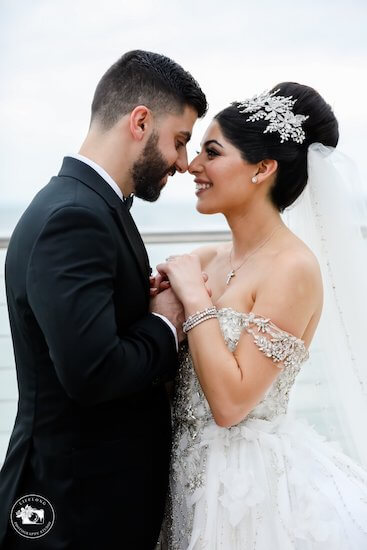 bride and groom snuggling at their Clearwater Beach wedding