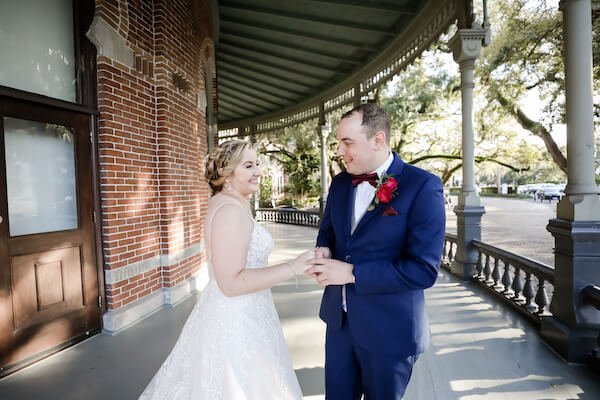 bride and groom after their first look at University of Tampa