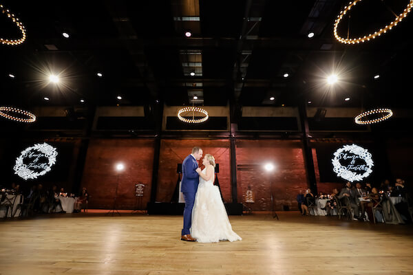 Tampa bride and groom during their first dance at the Armature Works