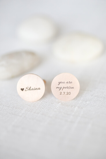 custom wedding day cufflinks that were a gift to the groom by his bride