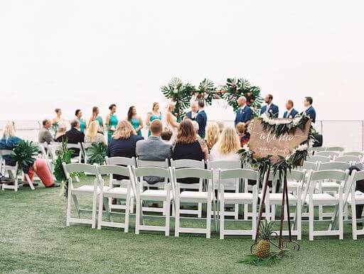 Hawaiian inspired Welcome sign outside of an intimate Opal Sands Resort wedding ceremony on Clearwater Beach