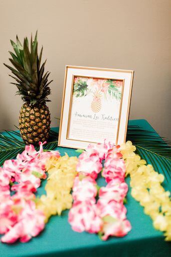 traditional Hawaiian floral leis for wedding guests at a Clearwater Beach Hawaiian inspired wedding