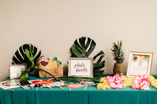 props, pineapples and Hawaiian inspired decor