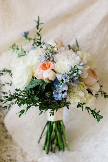 loose coral and blue bridal bouquet for a Clearwater Beach beach wedding