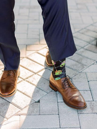 Tampa Bay groom wearing Teenage Mutant Ninja Turtle socks on his wedding day