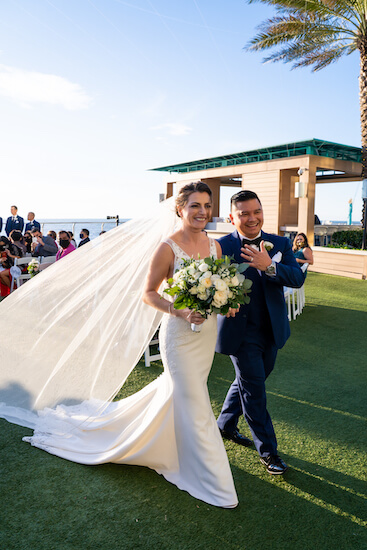 Just Married, newlywed couple excited after their Opal Sands wedding ceremony