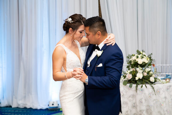 bride and groom's first dance at their Opal Sands Resort wedding reception