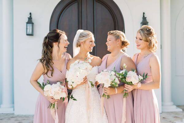 Bride and bridal party at harbor side chapel in Safety Harbor