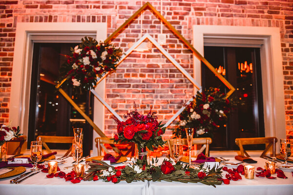 burgundy and gold wedding reception at Red Mesa in Downtown St Pete