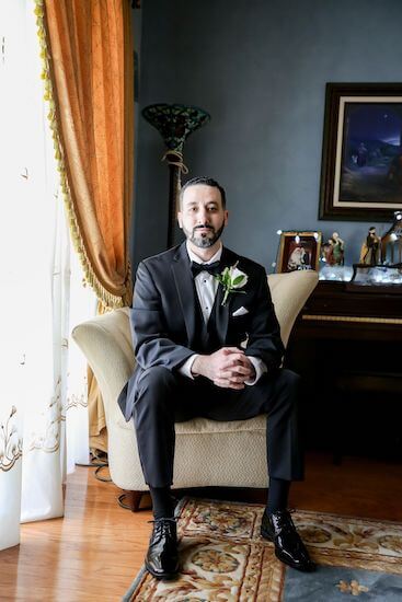 handsome Tarpon Springs groom in Black tie wedding attire