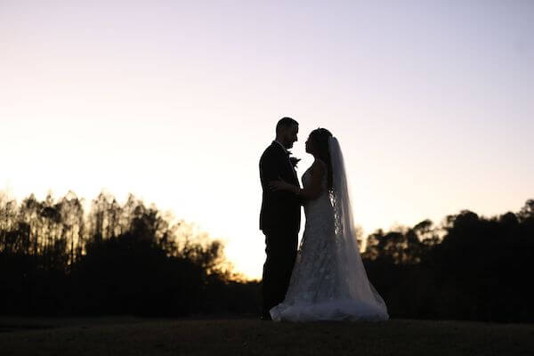 sunset wedding photos of bride and groom 