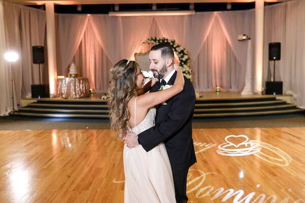 bride and groom during their first dance at their luxurious Tarpon Springs wedding reception