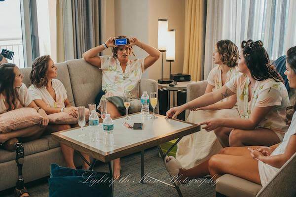 bridal party playing games before getting ready for the wedding