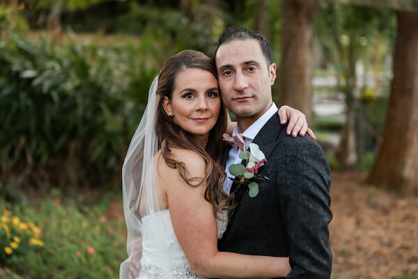 bride and groom hugging after wedding ceremony