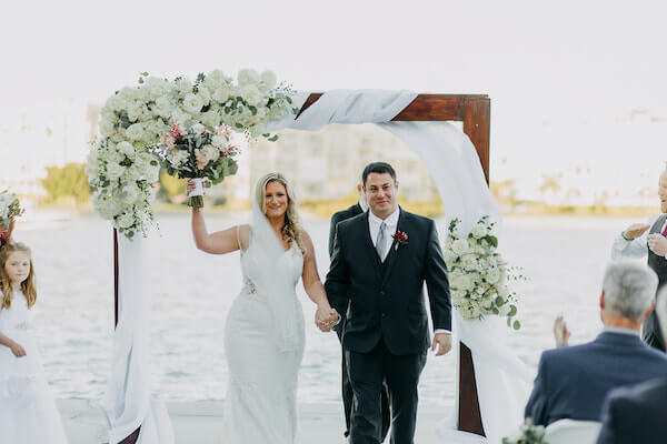 just married! Excited bride and groom after their st Pete beach wedding