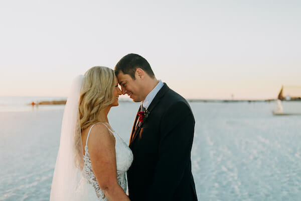 bride and groom at sunset on st Pete beach