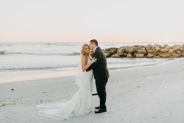 bride and groom at sunset on st Pete beach