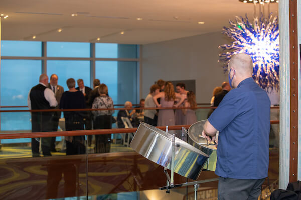 man playing steel drums during an Opal Sands Resort cocktail reception