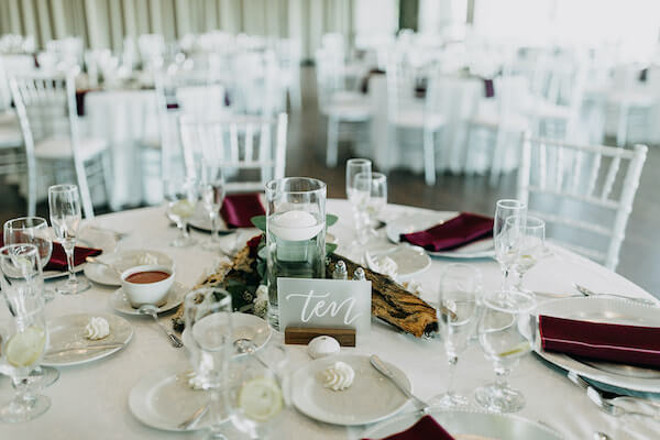 Centerpieces of driftwood, sea shells and floating LED candles at St Pete Beach Community Center's Boca Ciega Ballroom