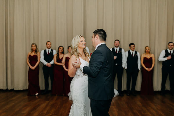 wedding party washes on as newlyweds have their first dance at the St Pete Beach Community Center