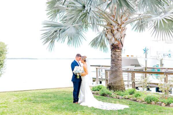 bride and grooms first look at Tampa Bay watch