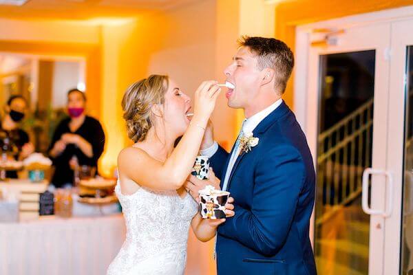 bride and groom chose to feed each other ice cream instead of wedding cake