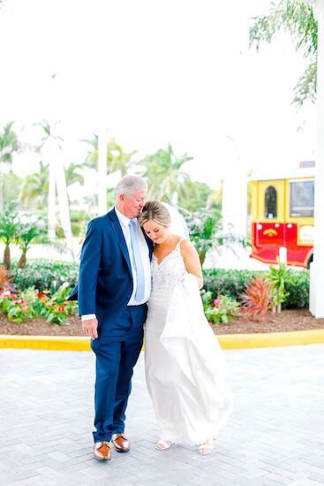 bride having a first look with her father before heading off to see her groom