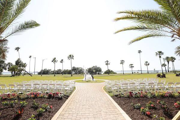 Outdoor wedding ceremony at the Fenway Hotel facing St Joseph Sound and Honeymoon Island