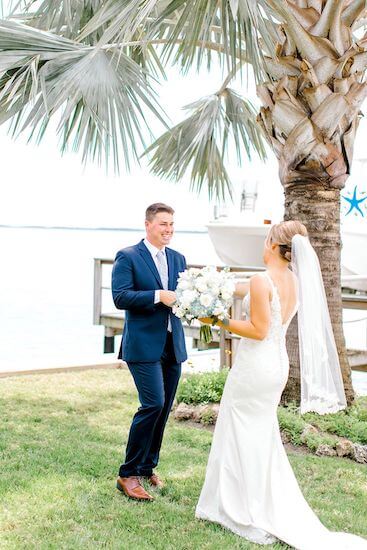 bride and grooms first look at Tampa Bay watch