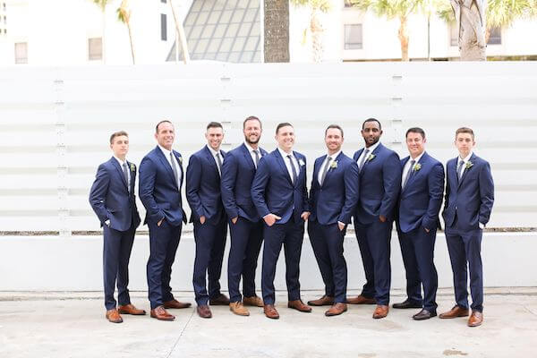 groom and groomsmen in blue suits