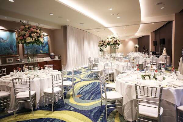 ballroom of the Opal Sands Resort set for wedding reception