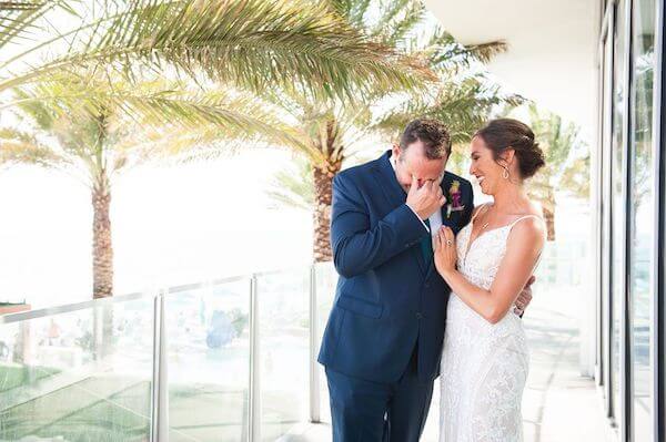 groom breaking into tears after seeing his bride for the first time