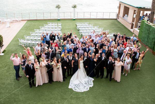 overhead view of a bride and groom with all of their wedding guests at the Opal Sands Resort on Clearwater Beach