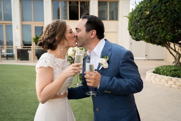 newlywed couple kissing after their Clearwater beach wedding