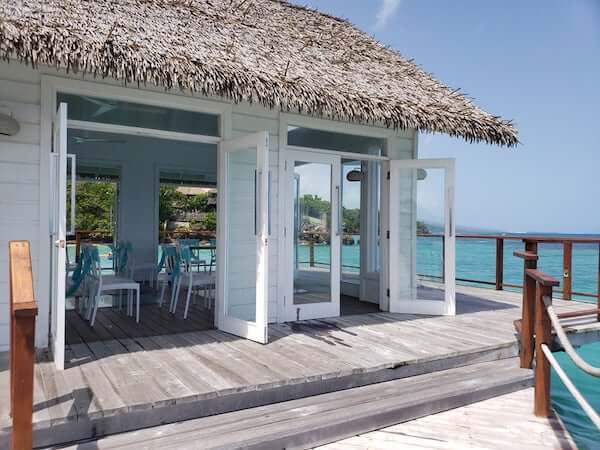 Sandals overwater wedding chapel with thatched roof and large French doors